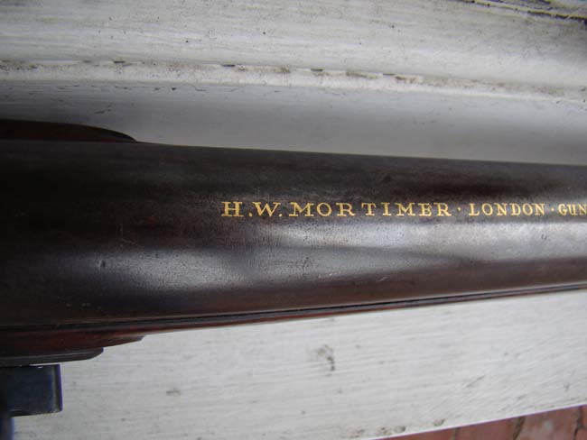 A late 18th or early 19th century steel barreled FLINTLOCK BLUNDERBUSS by H.W. Mortimer, London, Gun Maker to His Majesty, King George III. — image 2